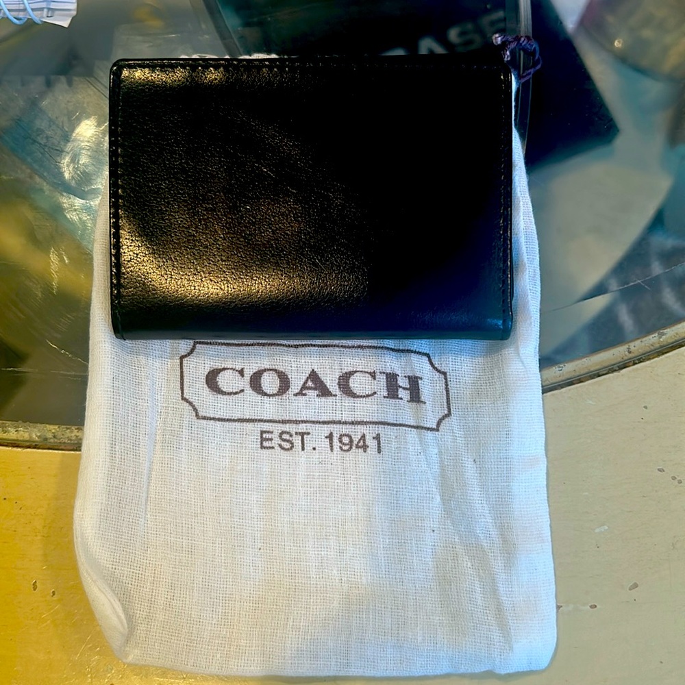 Black men’s coach leather trifold wallet never used with tags NEW